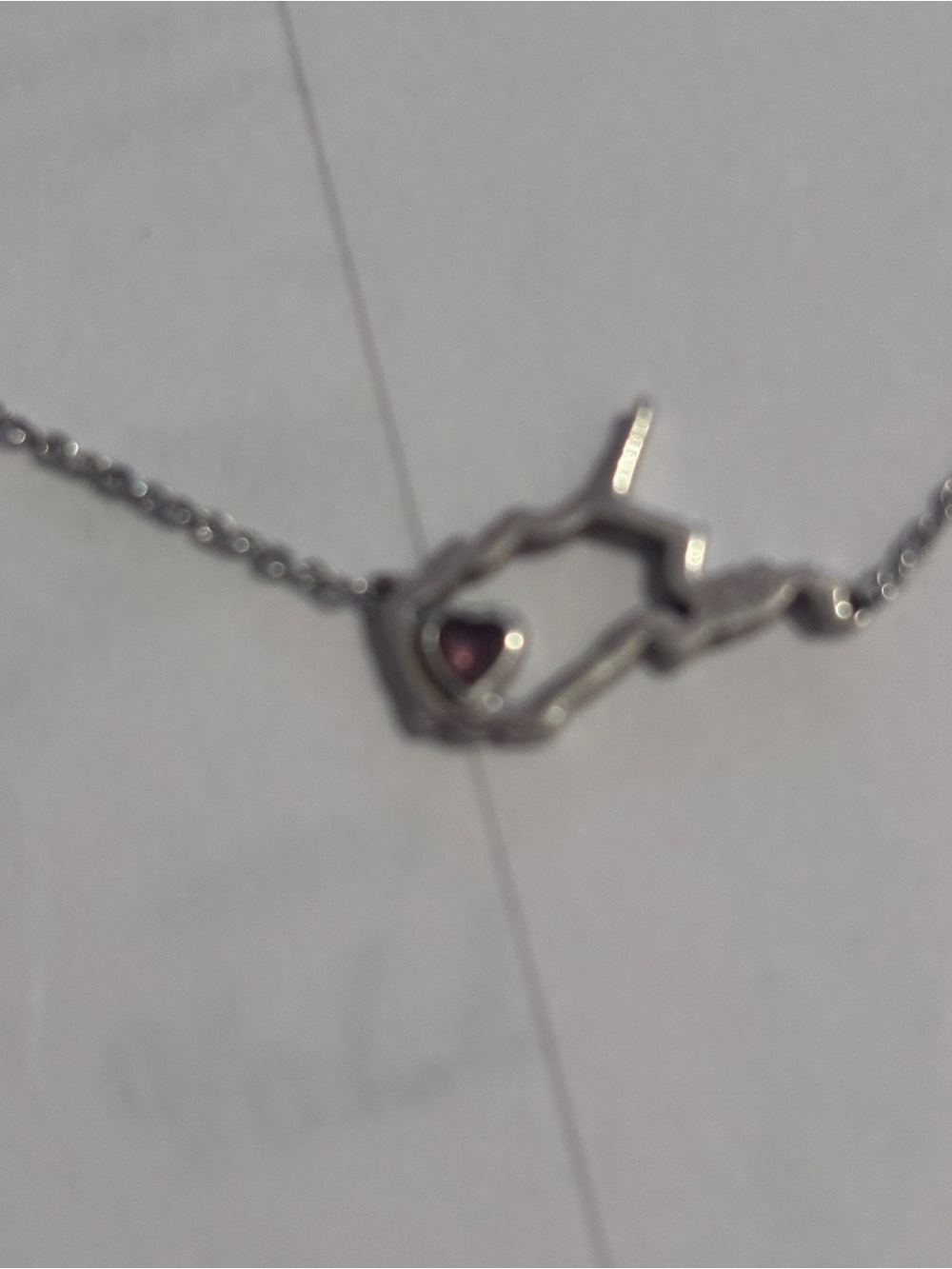 Heart in West Virginia sterling silver with pink Tourmaline heart .